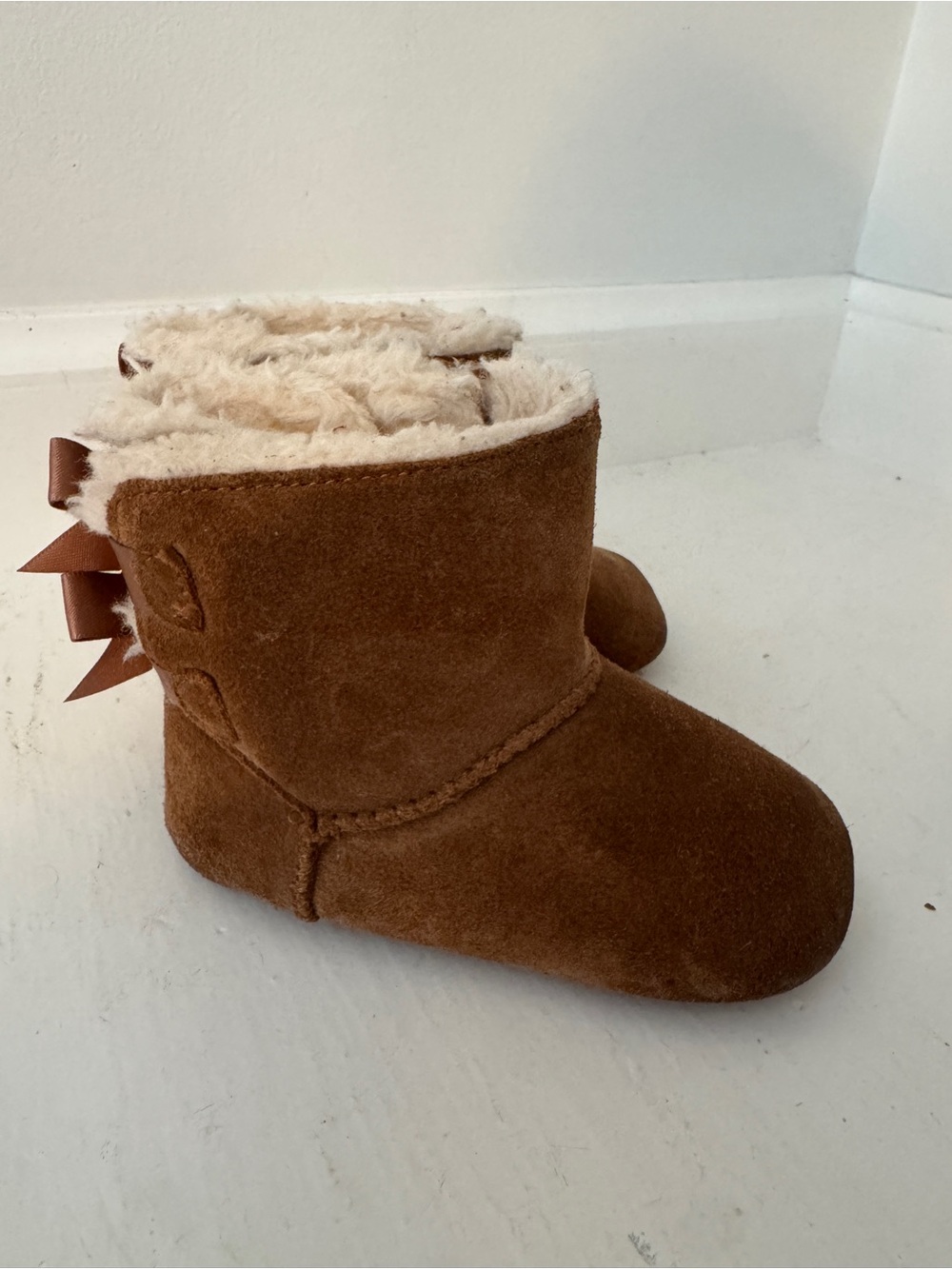 UGG Chestnut Suede Kids Shearling Lined Boots with Back Bows